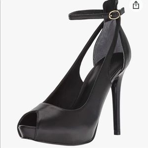 Black leather heels by Guess
